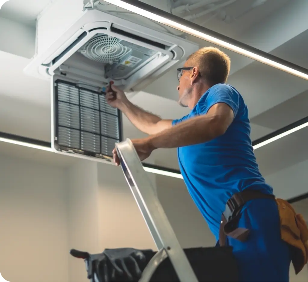 HVAC Technician Working on Cooling Solutions